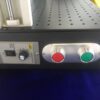 A close up of the buttons on a machine
