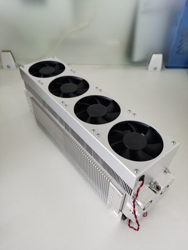 A silver fan unit sitting on top of a table.