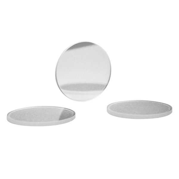 A set of three mirrors sitting on top of each other.