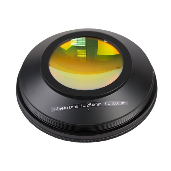 A black round object with a yellow reflection in it.