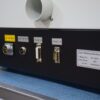 A black box with some white and gold labels