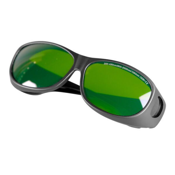 A pair of green glasses on top of a white table.