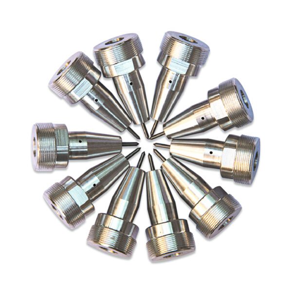 A group of 1 2 metal nozzles sitting in a circle.