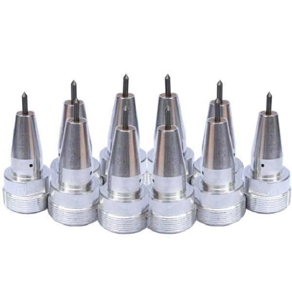 A group of 1 0 metal nozzles sitting side by side.